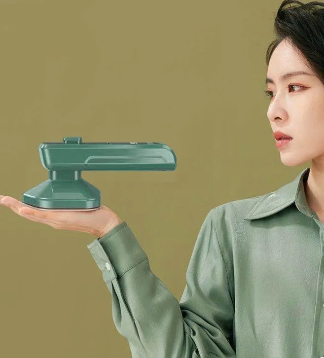 Dark green portable hanging ironing machine with ceramic panel and worldwide voltage adjustment