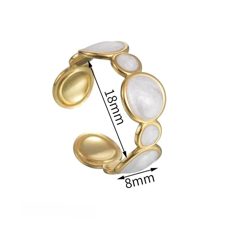Adjustable geometric stainless steel ring with electroplated finish