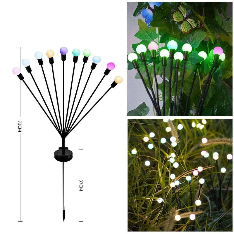 Solar-powered LED ground spike garden light with multiple heads and stainless steel soil plug.