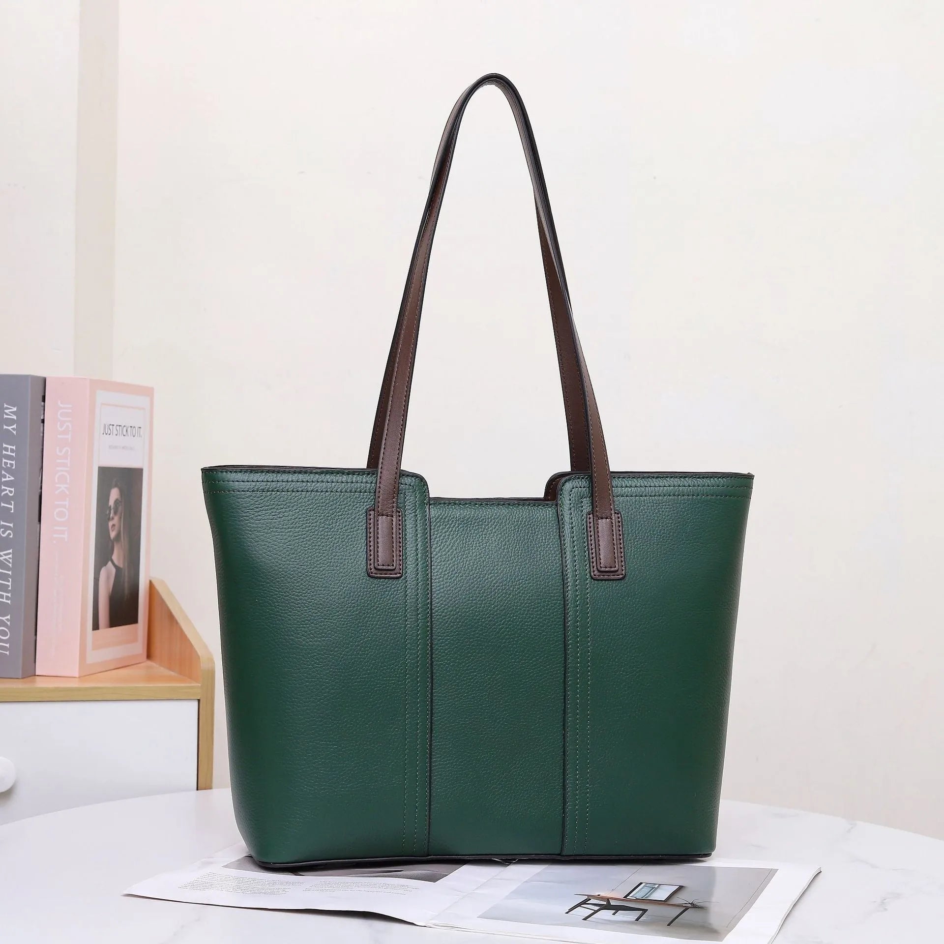 Genuine leather women's large shoulder bag in box-type design with sandwich pocket.