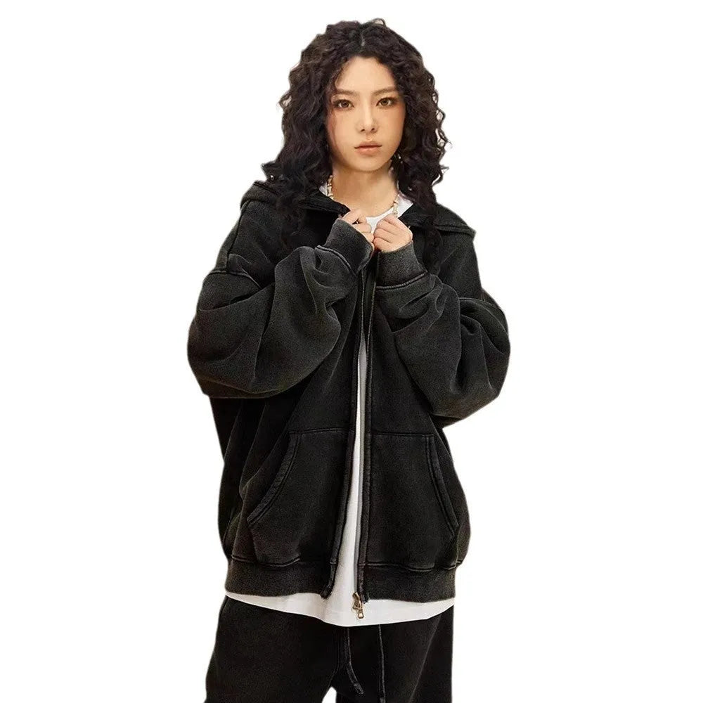 Men's vintage-style hooded cardigan sweater with a double zipper and fleece lining in a washed dark green colour.
