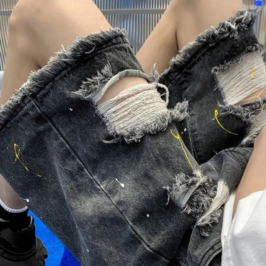 Men's water washed hole denim shorts in loose fit street style, available in black and light blue