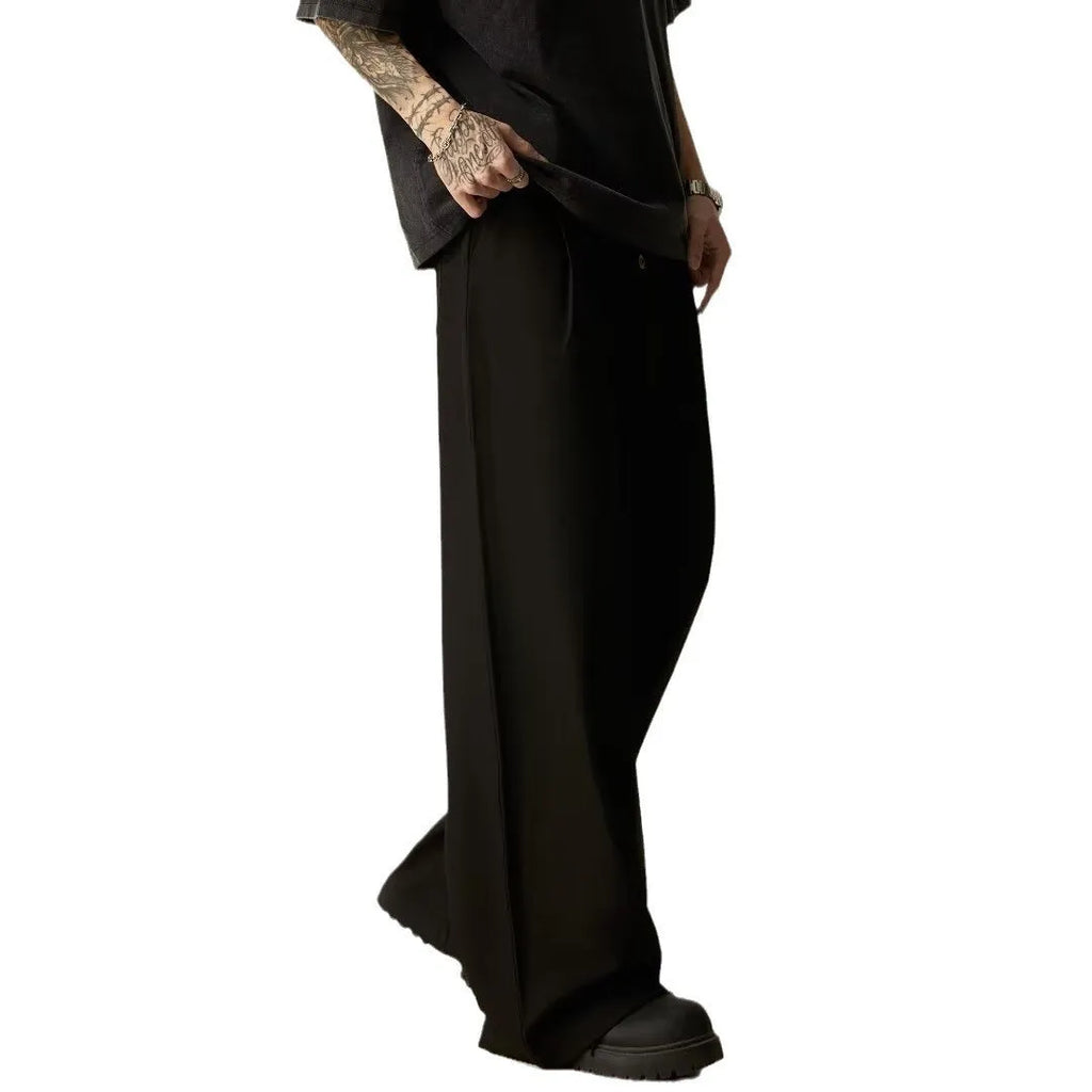 Men's black wide-leg casual trousers with straight cut and button fly detail