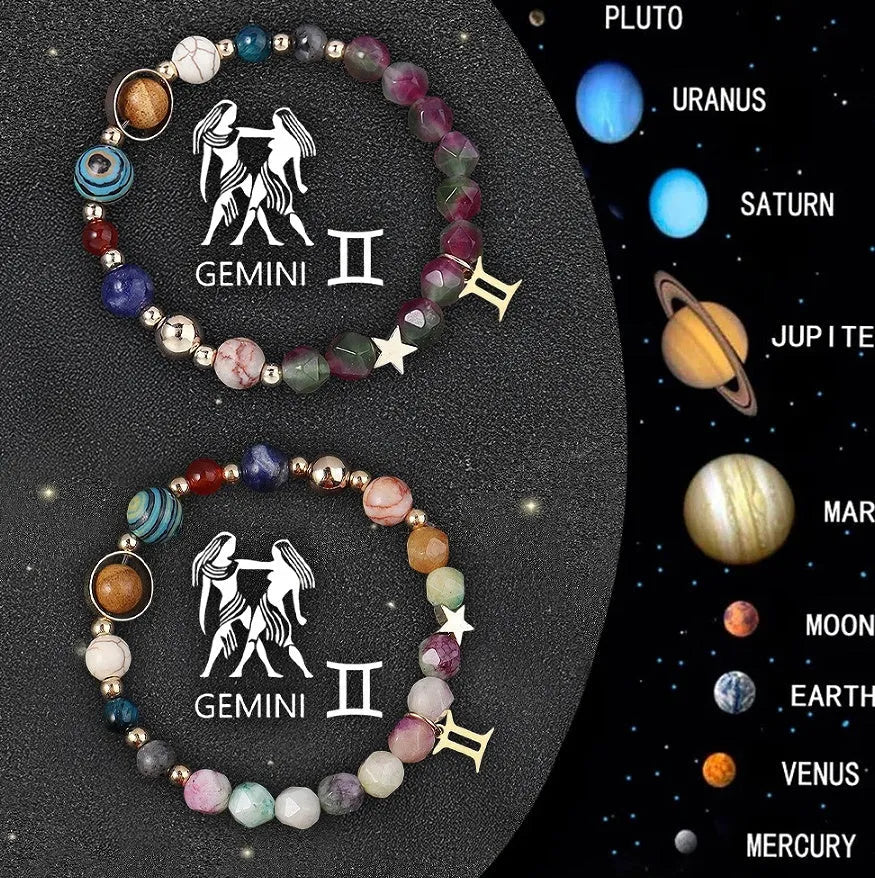 Set of two natural stone beaded bracelets on a wrist, each representing a different zodiac sign style.