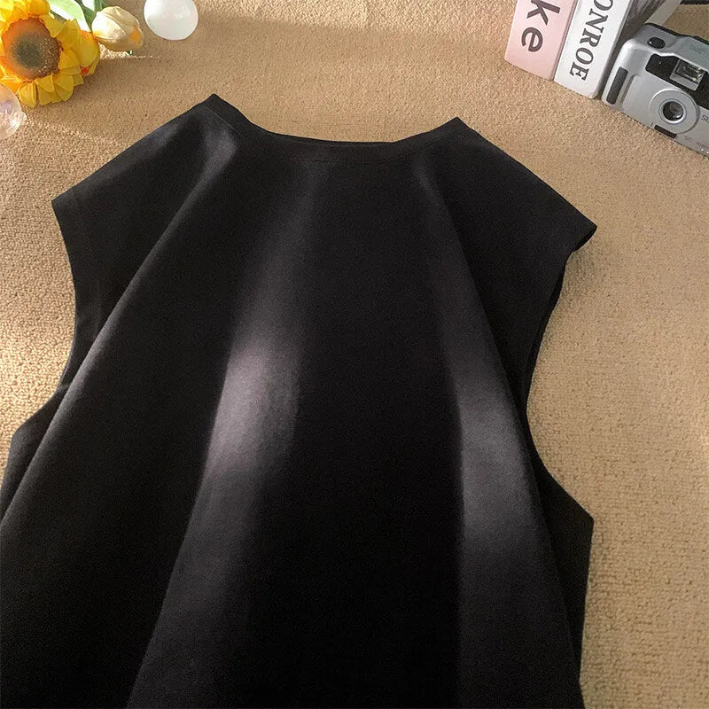 Men's loose solid colour cotton tank top sleeveless t-shirt on a hanger.