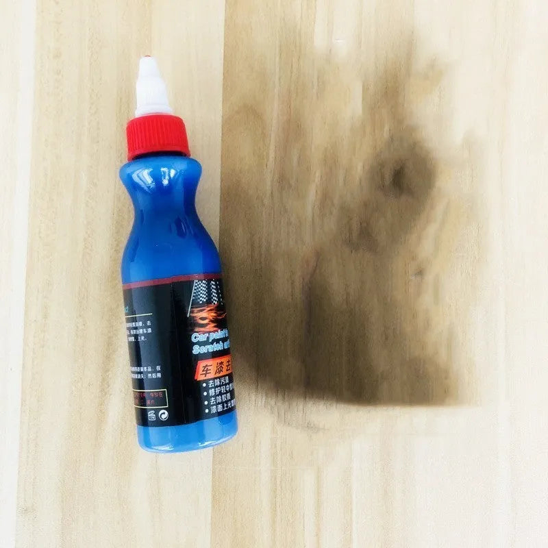Blue automotive scratch repair agent with wiping tool for car paint restoration