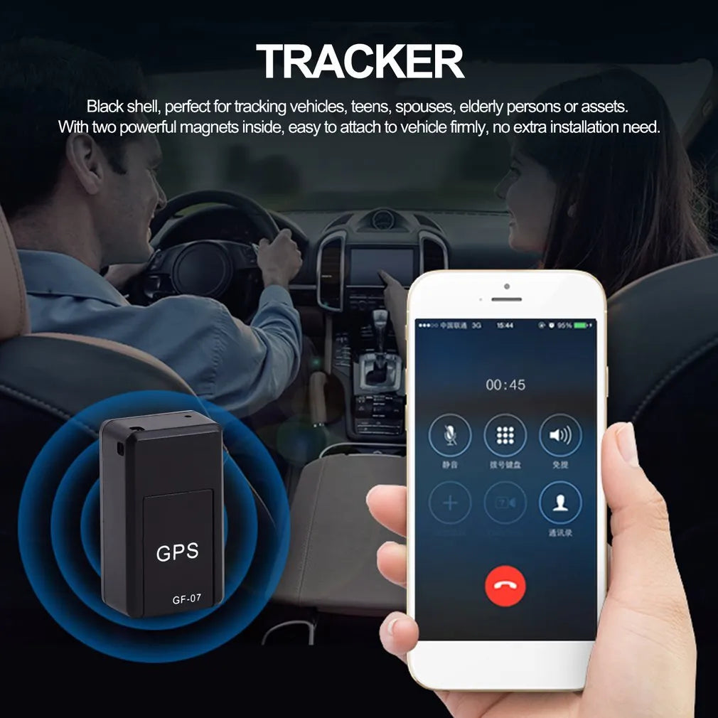 Black plastic magnetic GPS car tracker device measuring 35x20x14mm with USB charging cable