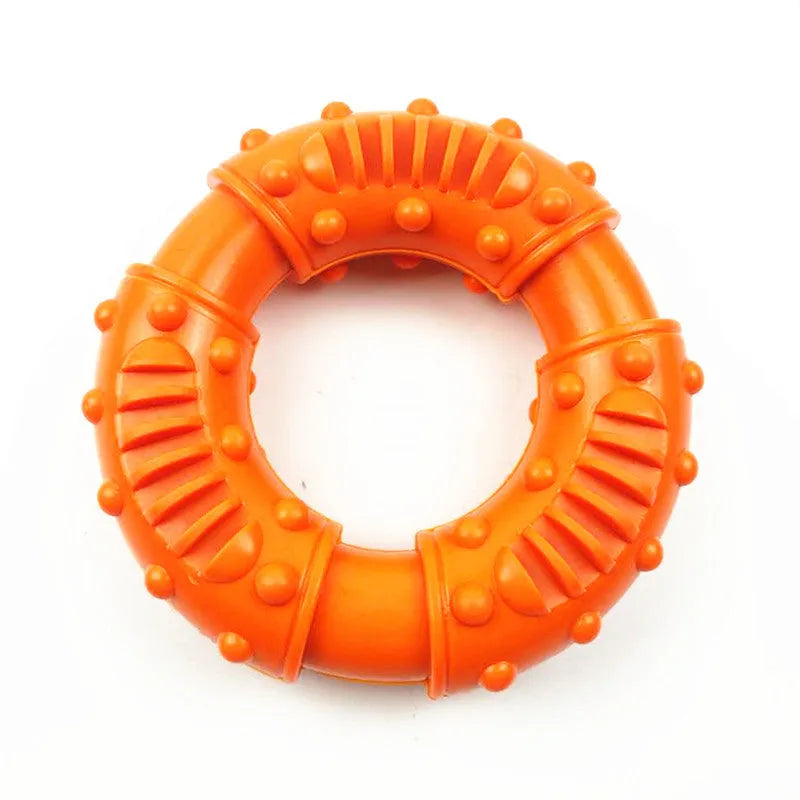 Blue hollow dog fetch stick toy on grass, showing lightweight, chewable design for outdoor play.