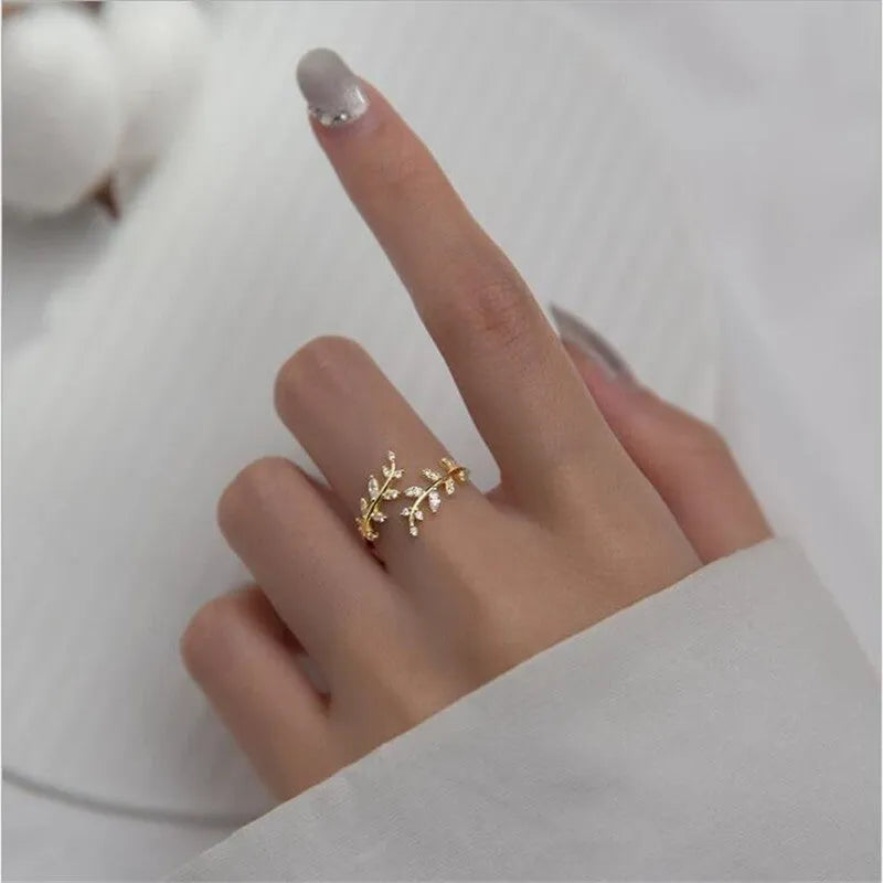 Women's copper branch ring with leaf design in silver or gold electroplated finish
