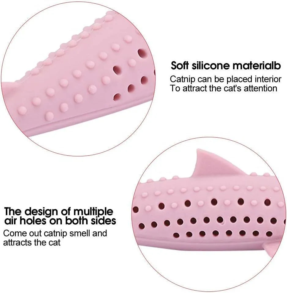 Green silicone fish shaped cat chew toy with breathable side holes on a white background