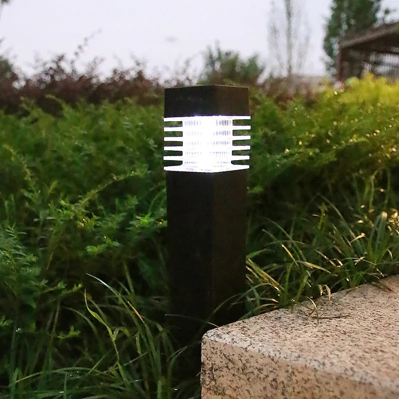 Solar lawn ground lamp with cuboid design for garden placement