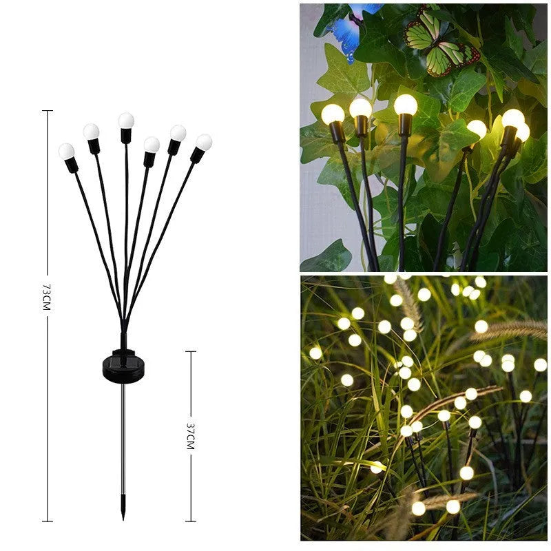 Solar-powered LED ground spike garden light with multiple heads and stainless steel soil plug.
