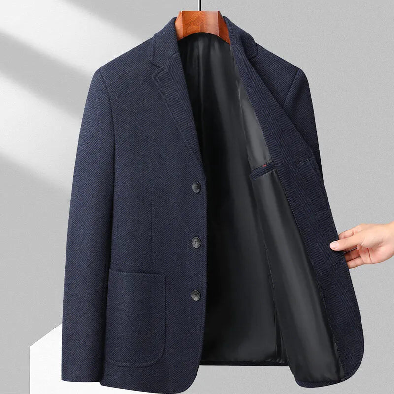 Men's loose fit woolen coat in a solid colour, shown on a model for casual spring or autumn wear.