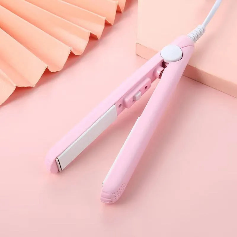 Mini hairdressing splint kit with a heated straight clip and storage box in one of five colours.