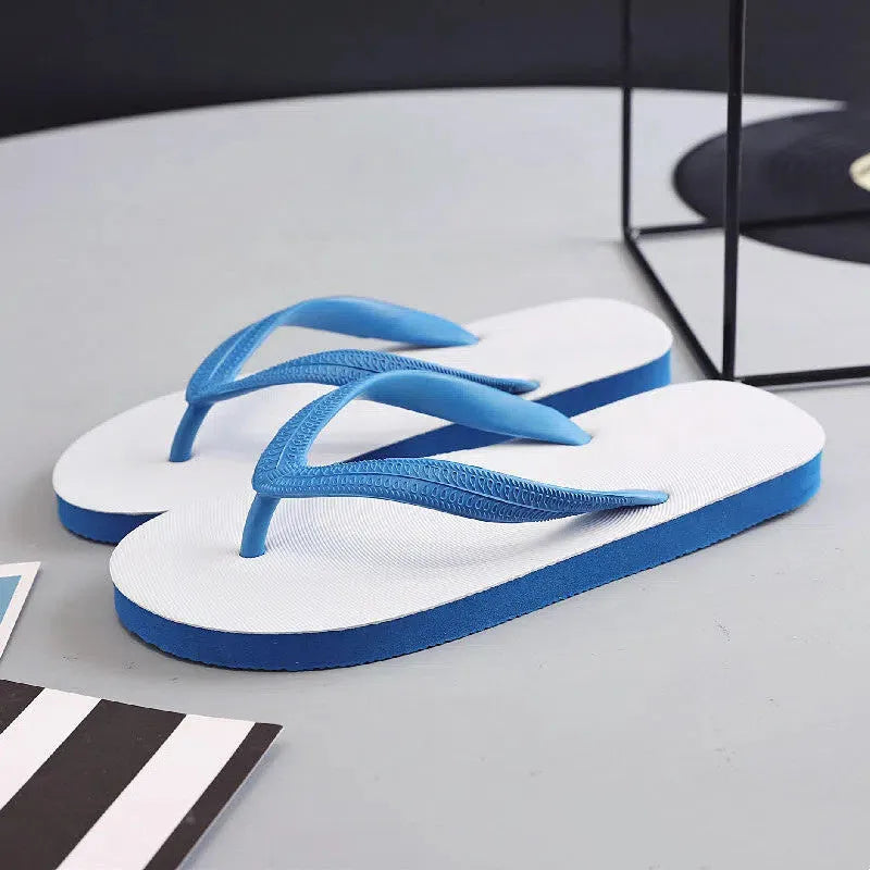 Colour options for rubber flip-flops with fish label: green, red, blue, and black.