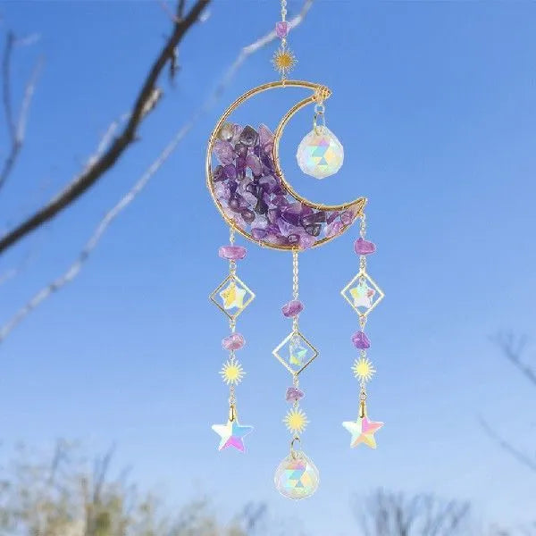 K9 crystal moon pendant hanging from a car rear-view mirror in sky blue colour