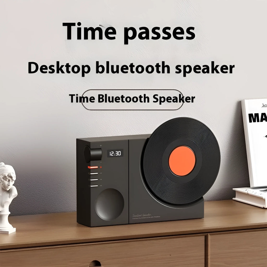 Mini portable Bluetooth speaker in Obsidian Black, Ivory White, Coral Pink, or Plum Green with USB charging port