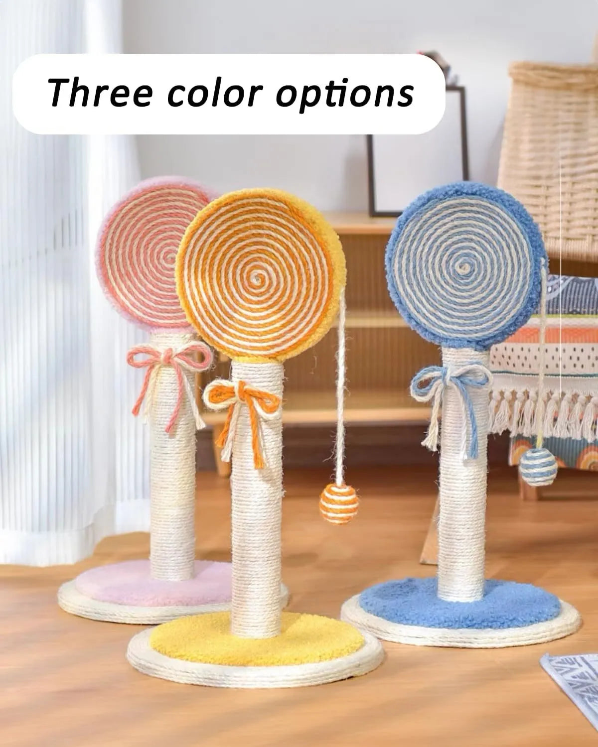 Blue cat scratching post with natural sisal rope and hanging ball toy on sturdy wood base