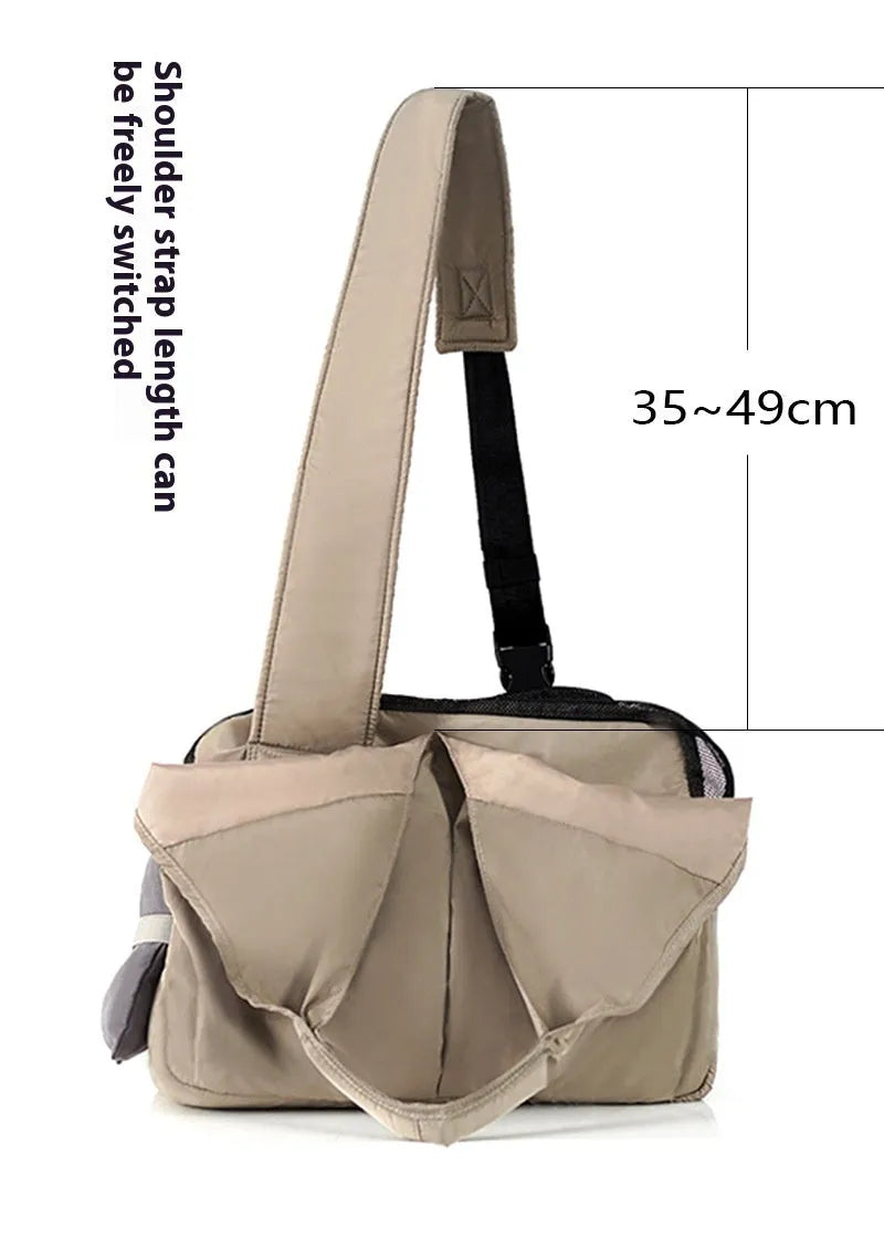 Apricot coloured cloth pet handbag carrier with dimensions 41 cm by 16 cm by 28 cm.