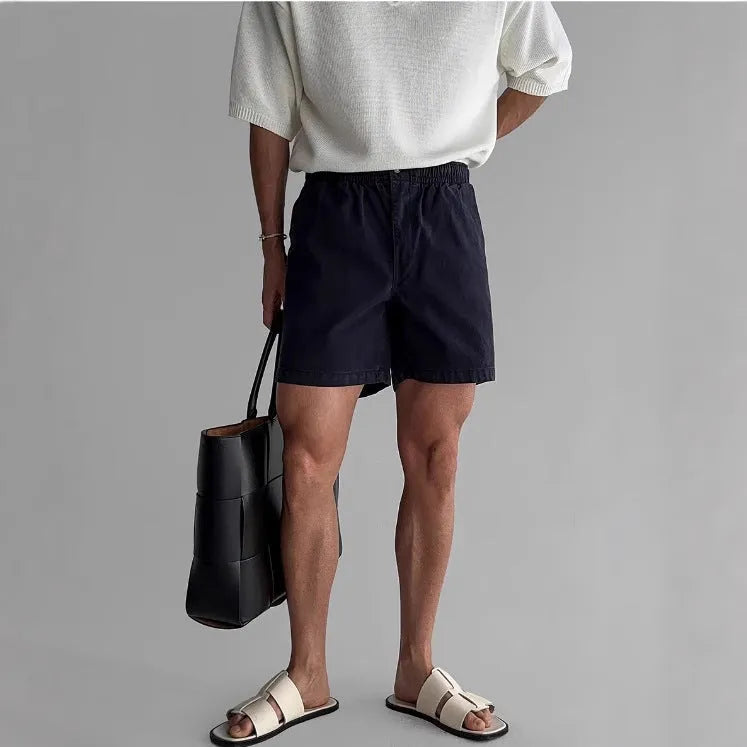 Cotton loose fit sports shorts in black, white or khaki colours for summer sports activities