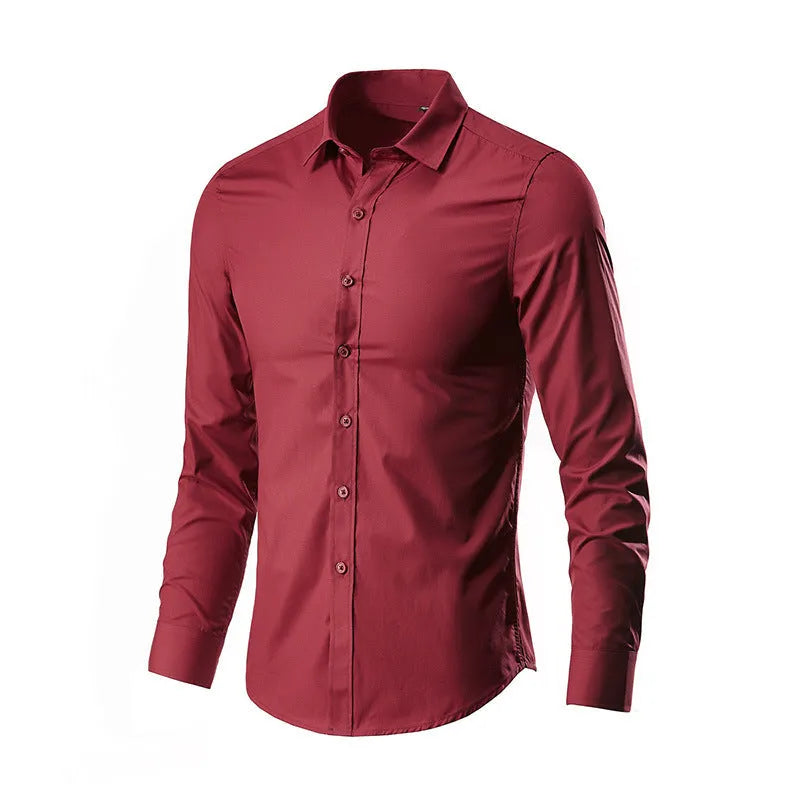 Man wearing a loose fit long-sleeve linen shirt in a neutral colour, showcasing the casual silhouette.