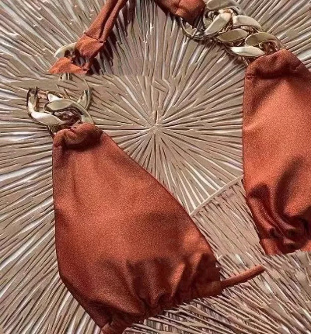Brown women's tube top bikini swimsuit with push-up design and ring tether detail.
