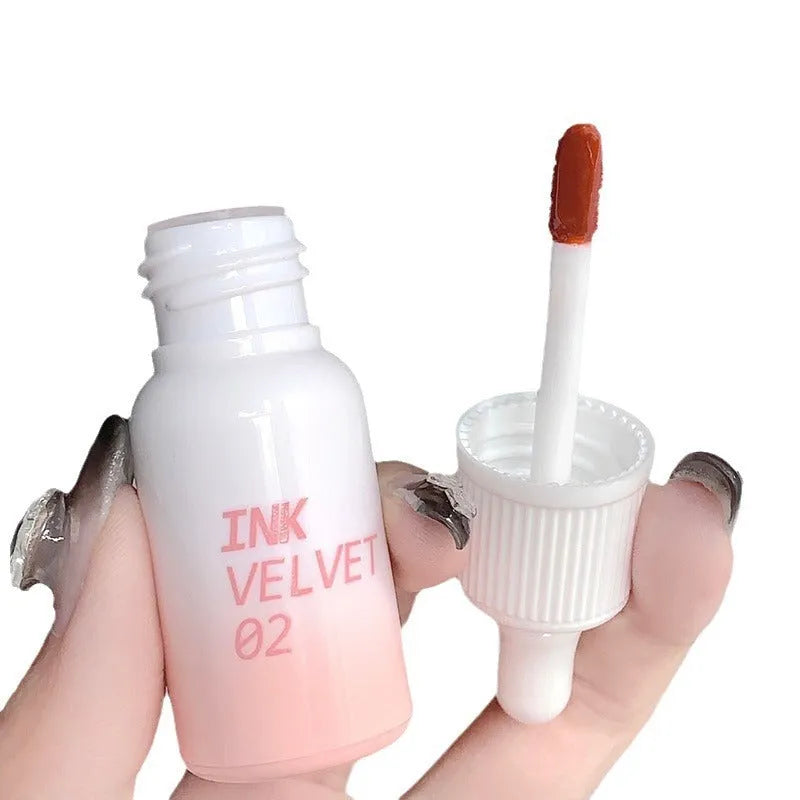 Mirror Lip Lacquer tube in 3.5g size showing four shade options from Milk Huhoo series