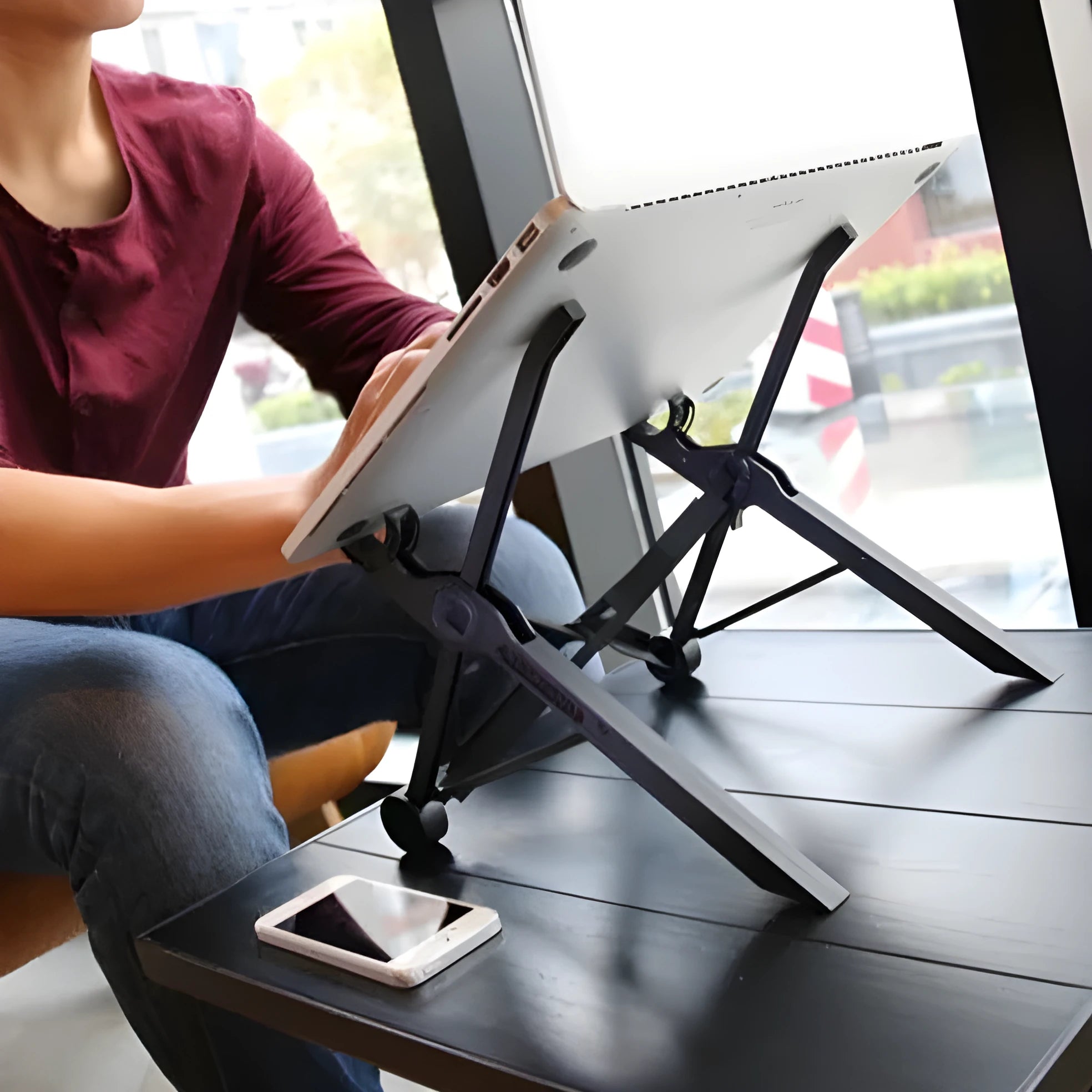Sagacious black portable folding laptop bracket with carrying case shown at 40cm folded size