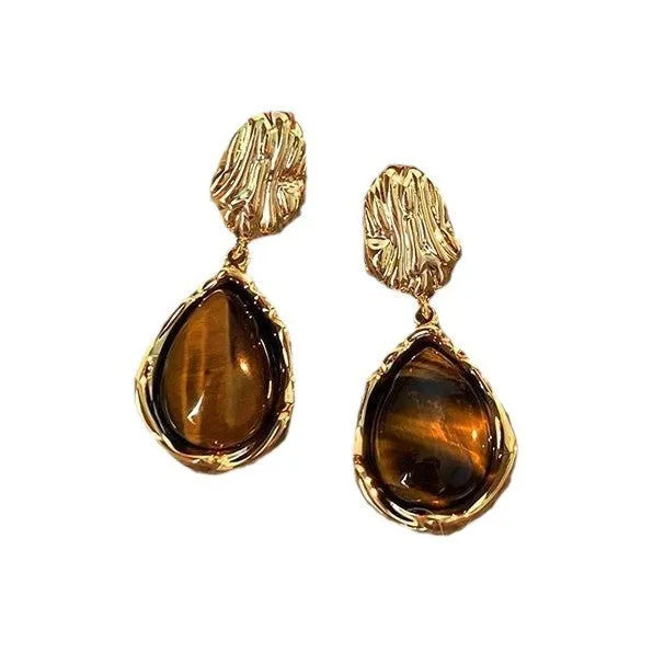 Handmade alloy holiday earrings set showing three geometric styles with tassel detailing