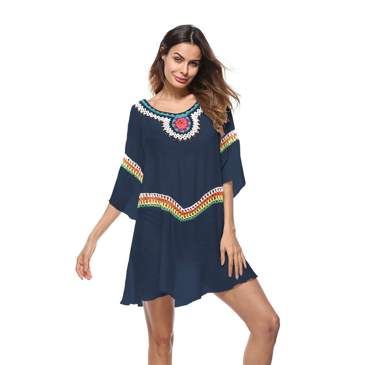 Crocheted ethnic style women's sun protection clothing in apricot colour for beach wear.