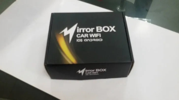 Black car mirror link box converter unit with power cable, AV cable, antenna, and user manual for smartphone screen mirroring.
