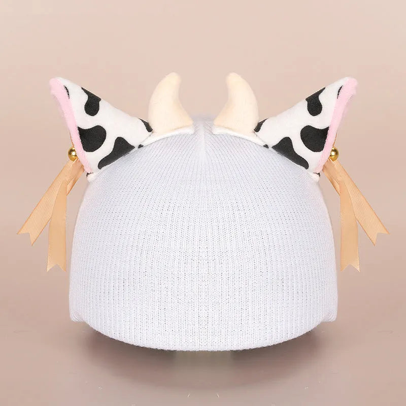 Cartoon-themed plush fabric helmet cover and ear decorations set for motorcycles and bicycles.