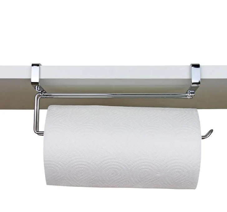 Silver stainless steel paper towel rack mounted on a white cabinet door.