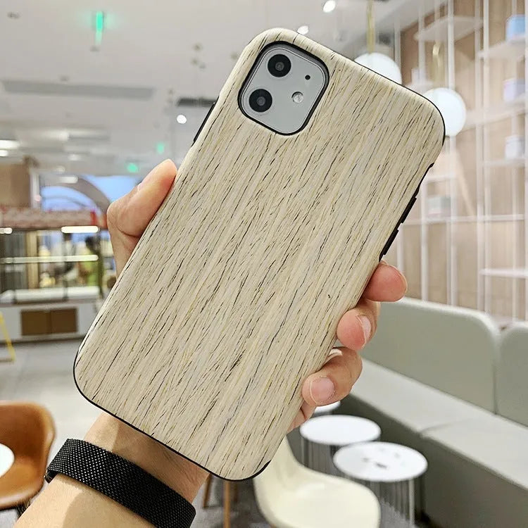 Wooden iPhone back cover case in rosewood finish showing precise cutouts for camera and ports.