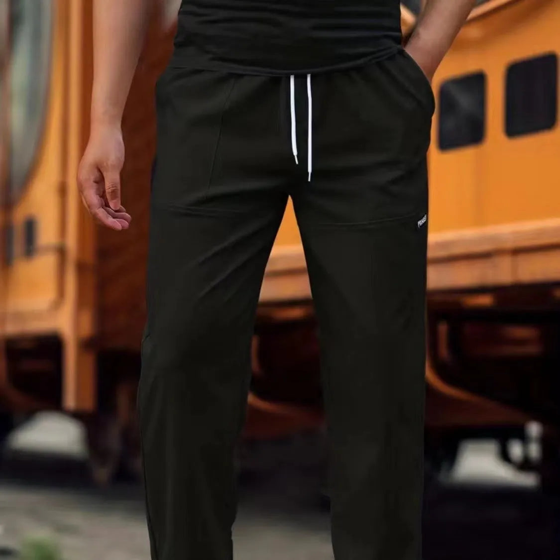 Men's polyester trousers for spring and autumn in light grey, available in sizes S to XXXL.