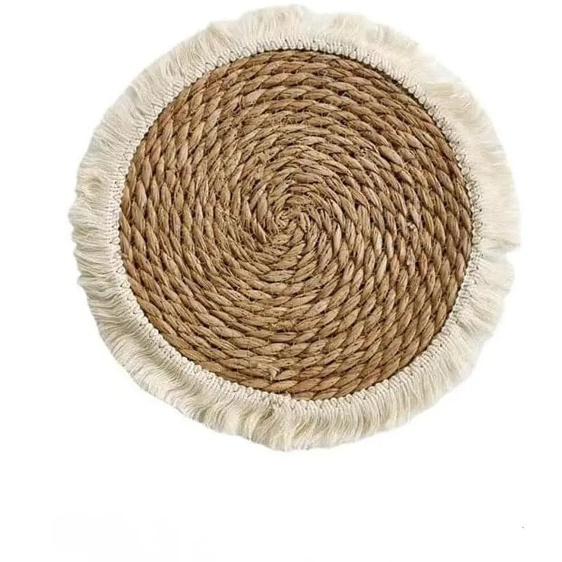 Round papyrus straw placemat with corn rope tassel detailing in modern simplicity style