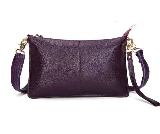 Lady cowhide slant bag in apricot showing top layer leather texture and dual straps
