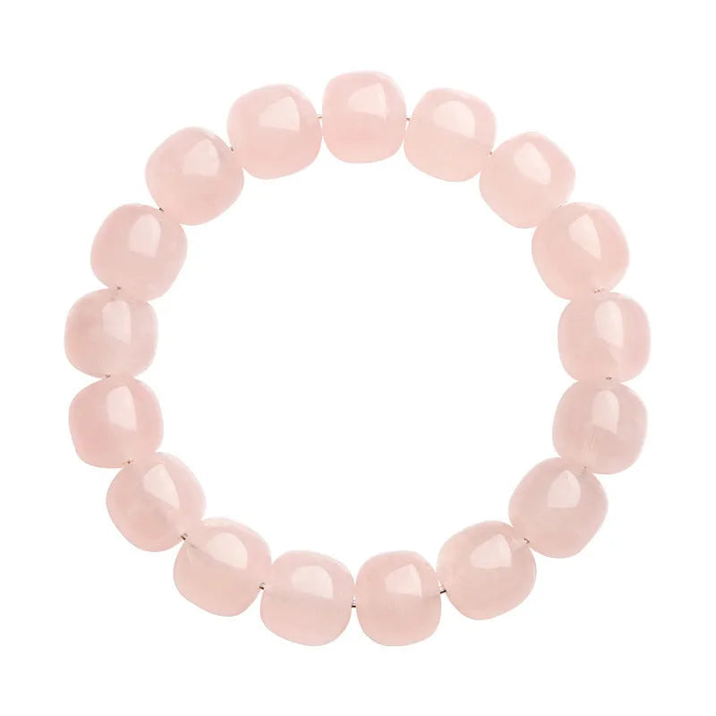 Pink bamboo crystal bracelet with 11-12mm barrel beads and geometric elements
