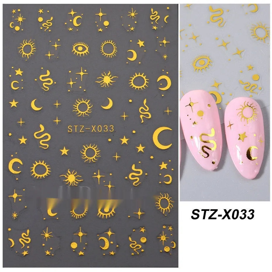 Sheet of black and silver love heart pattern nail art stickers with a plastic nail patch.