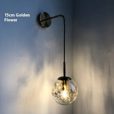 Modern glass wall lamp with silver or gold finish in 15cm or 20cm diameter options