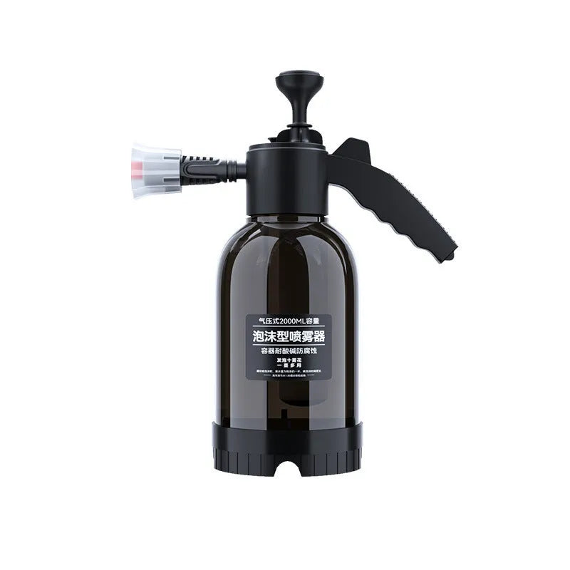 Black plastic 2-litre foam watering can sprayer with handle and spray nozzle.