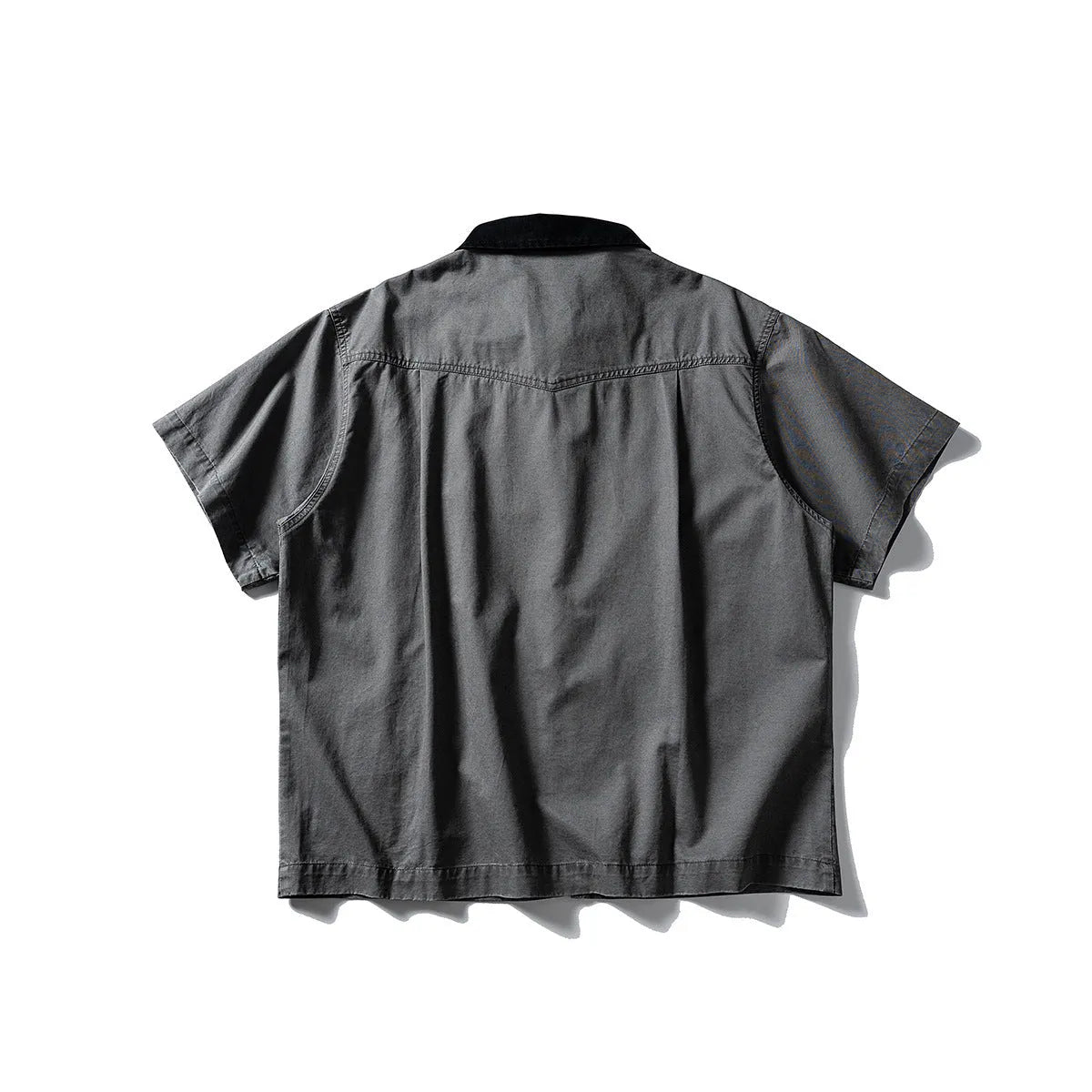 Men's washed cotton overall shirt with short sleeves in loose fit cardigan style, shown in khaki colour