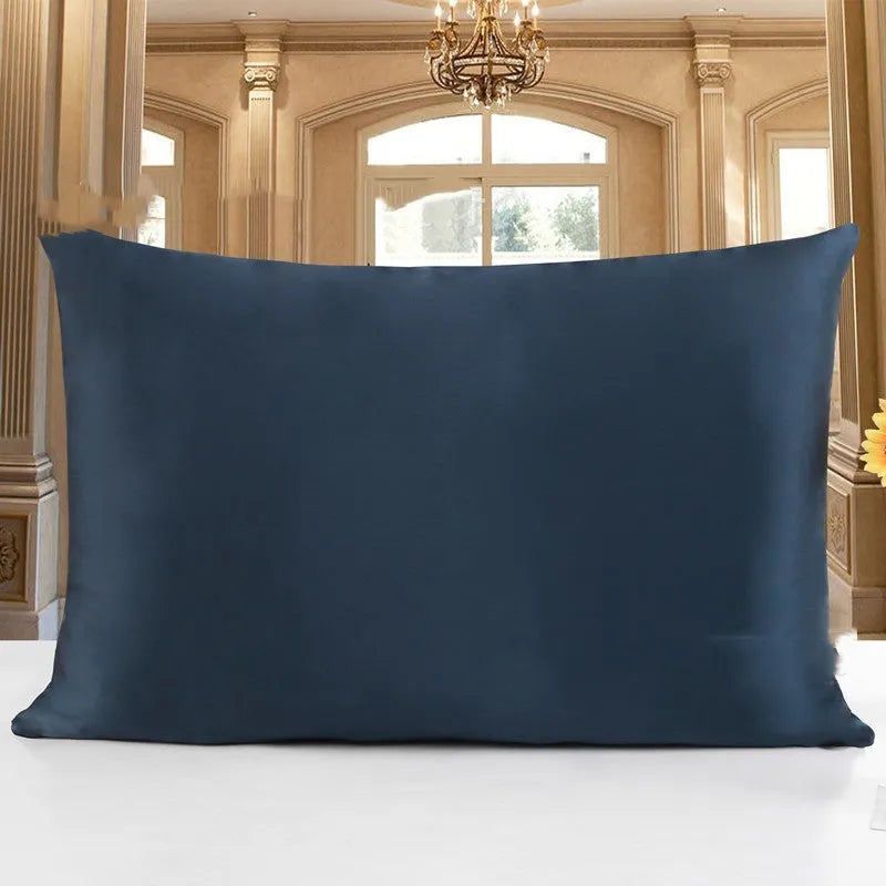 Double-sided silk pillowcase showing reversible design in apricot colour with three size options displayed