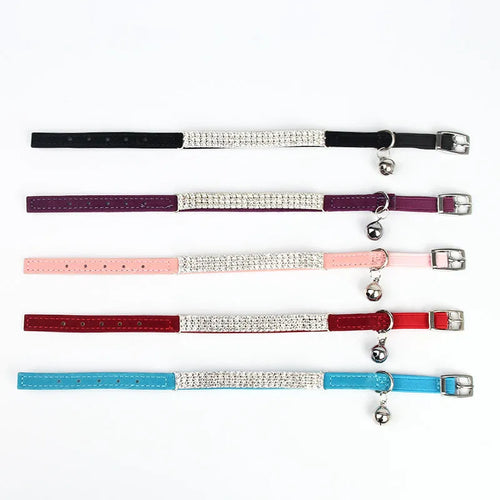 Adjustable velvet cat collar with rhinestones on a black background showing red, blue, and purple colour options.