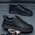 Men's Korean-style low-top sneakers in all black colour with round toe and rubber sole