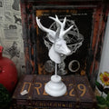 Hand-carved natural resin animal statue in black, white, and wood colour, 32cm tall.