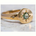 Gold oval ring with asterism detailing and adjustable opening on zinc alloy base