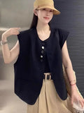 Women's loose fit polyester vest in milky white with pocket detail and 40cm length