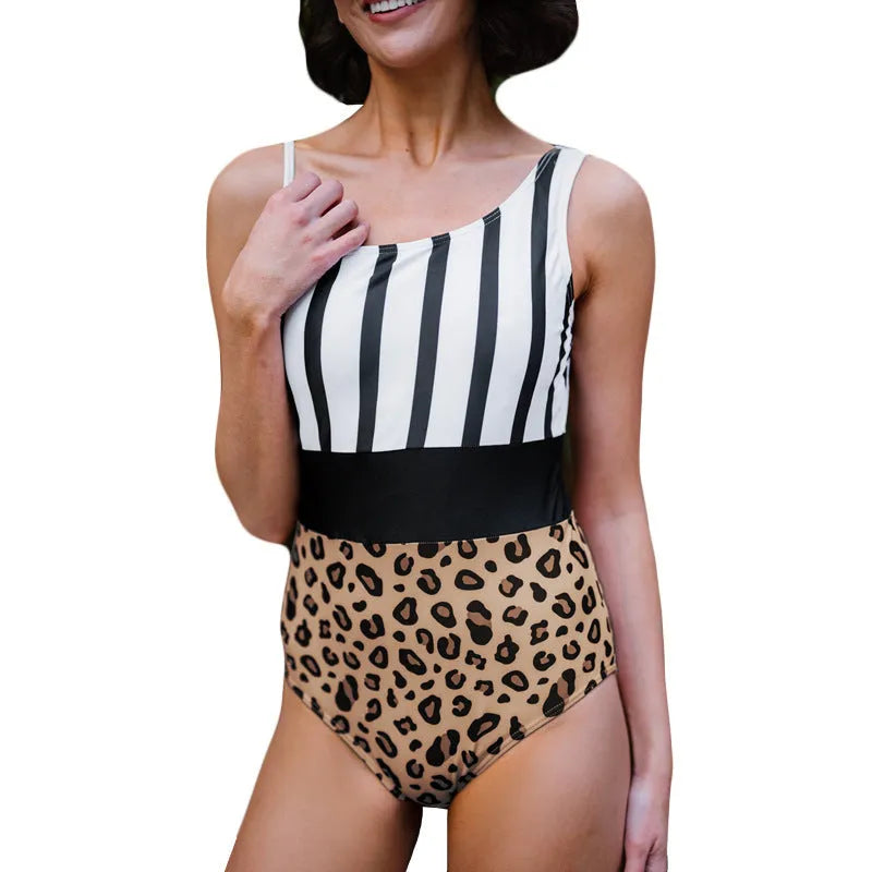 Women's leopard print one-piece swimsuit with an asymmetric collar and high waist triangle design.