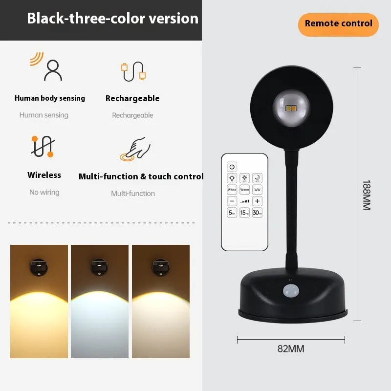 Modern geometric rechargeable wireless wall spotlight lamp in black on a white wall.